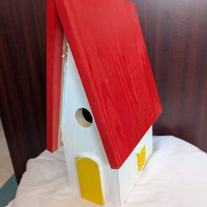 White Bird House with Red Roof