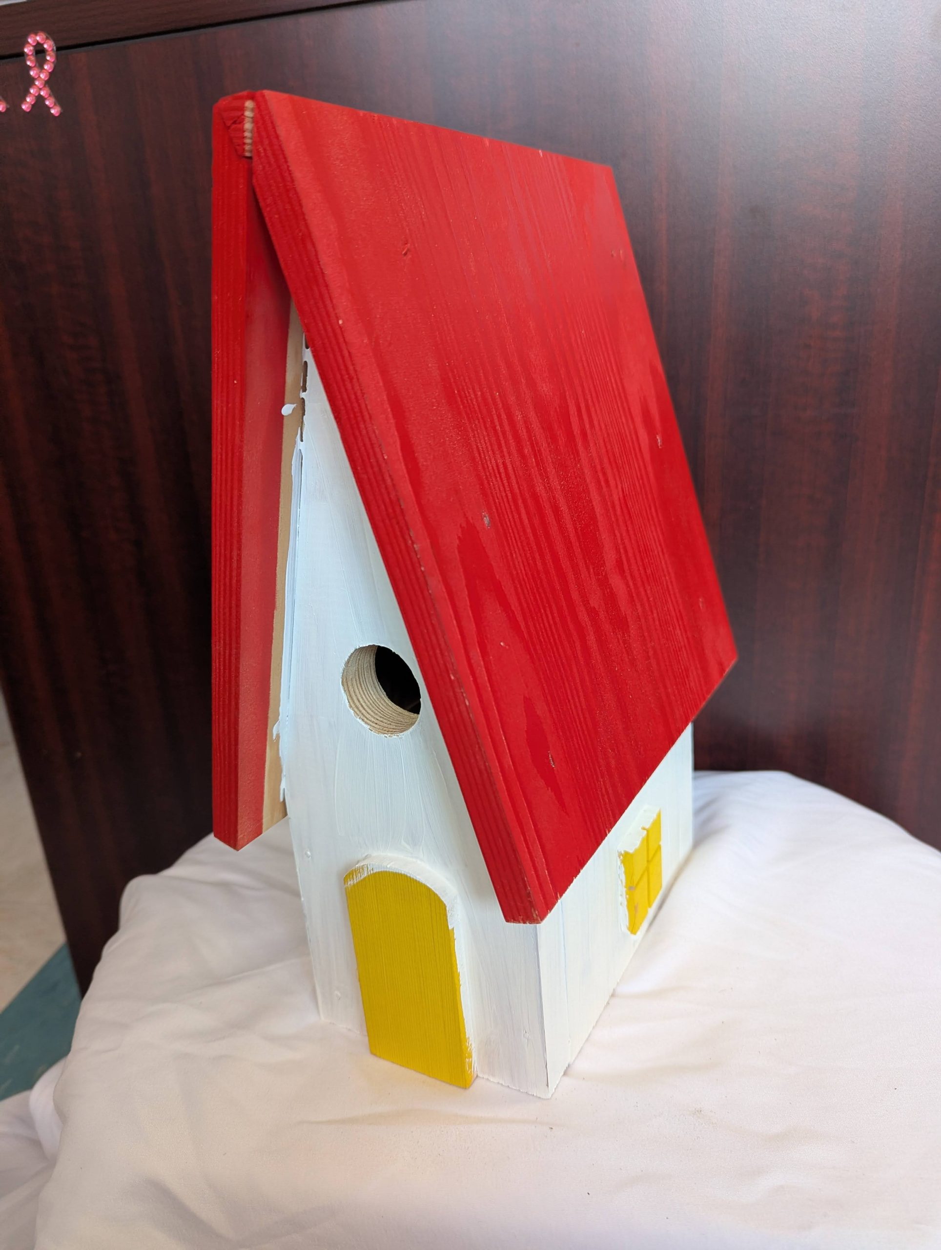 White Bird House with Red Roof